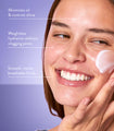 A young woman applies Mattifying Moisturizer for Oily Skin to her cheek with a smile with highlights of how the product minimizes oil and controls shine, is weightless hydration without clogging pores, and has a smooth, matte, breathable finish