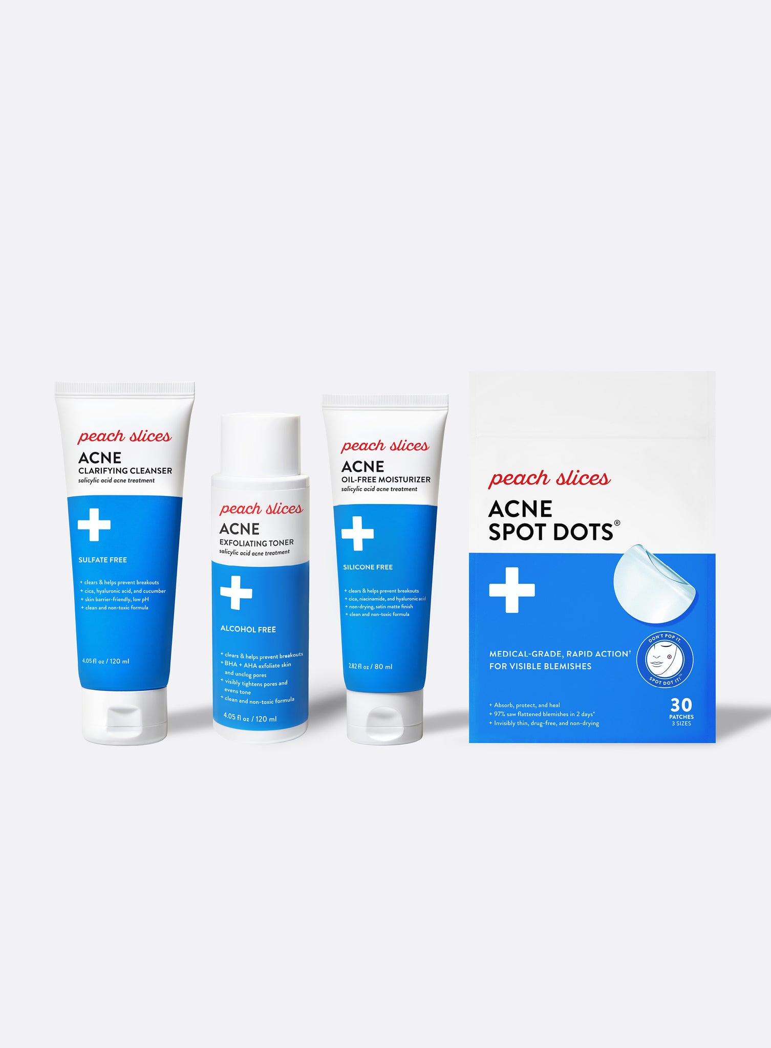 A lineup of the Peach Slices Acne System including the Acne Clarifying Cleanser, Acne Exfoliating Toner, Acne Oil-Free Moisturizer, and Acne Spot Dots